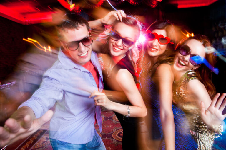 Group,Of,Young,People,Having,Fun,Dancing,At,Party.